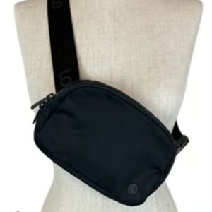 Lolë Black Waist Bag / Crossbody Sling. Black